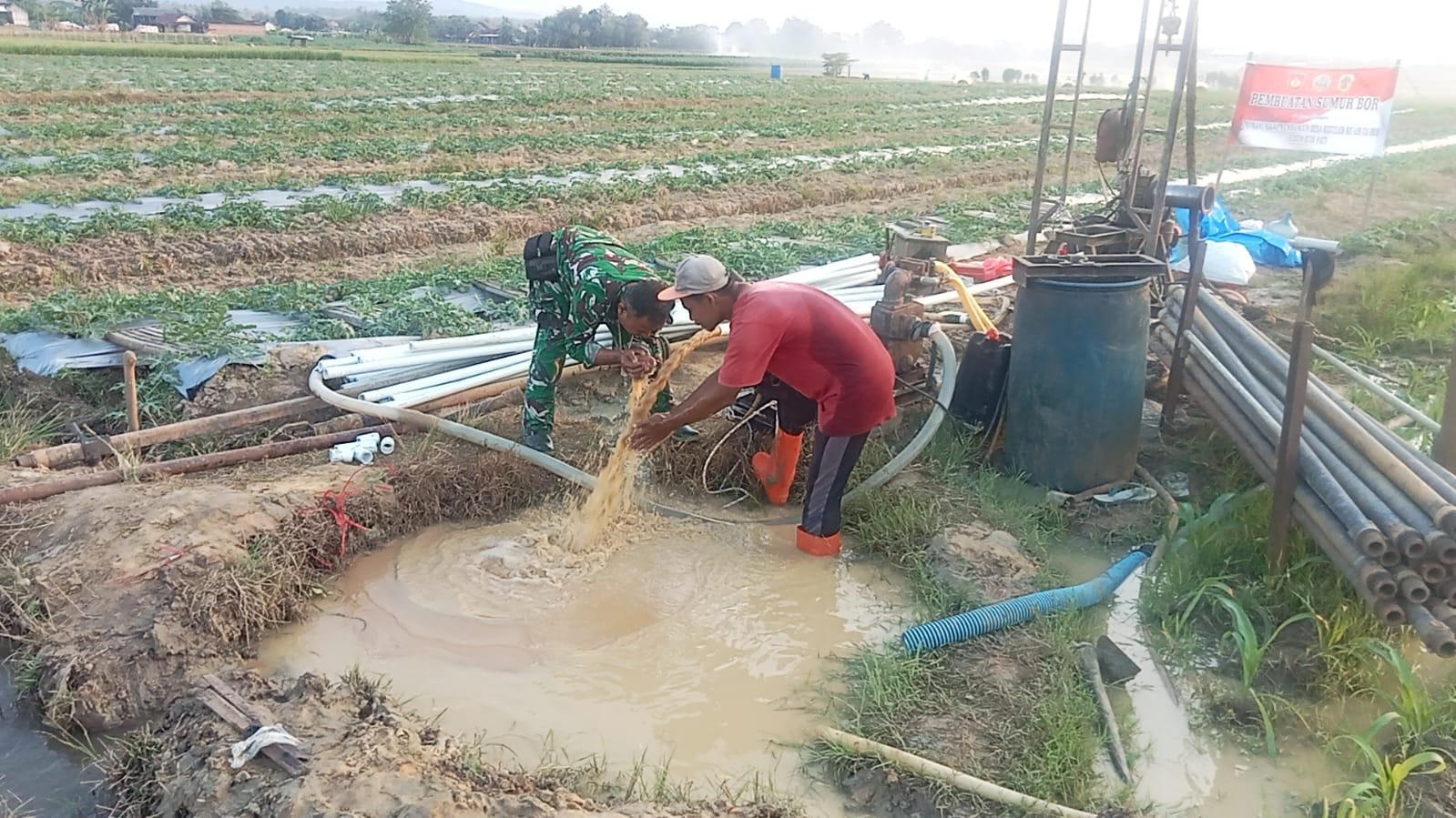 Sumber Air Sumur Bor TMMD di Titik 4 Mulai Dinikmati Warga, Petani Desa Godo Bersyukur