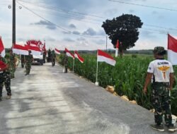 Pemasangan Bendera Merah Putih Semarakkan Penutupan TMMD di Desa Godo