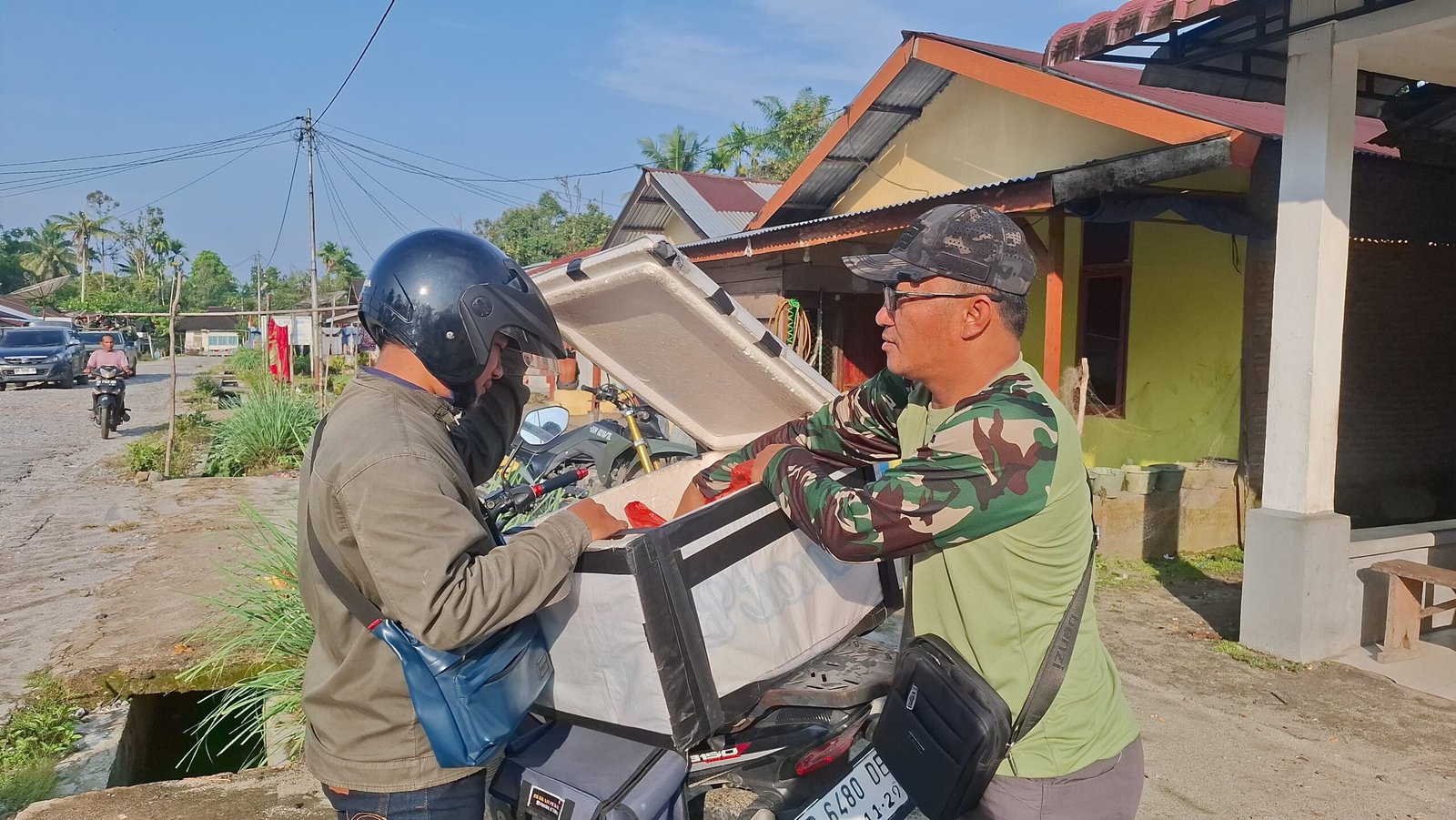 TMMD Ke 129 Kodim 0210/TU membawa Berkah Pedagang Susu Kedelai Dan Bubur