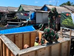 Pembongkaran Papan Mal Tandai Kemajuan Pembangunan Manunggal Air Bersih TMMD Ke-129 di Desa Umbele